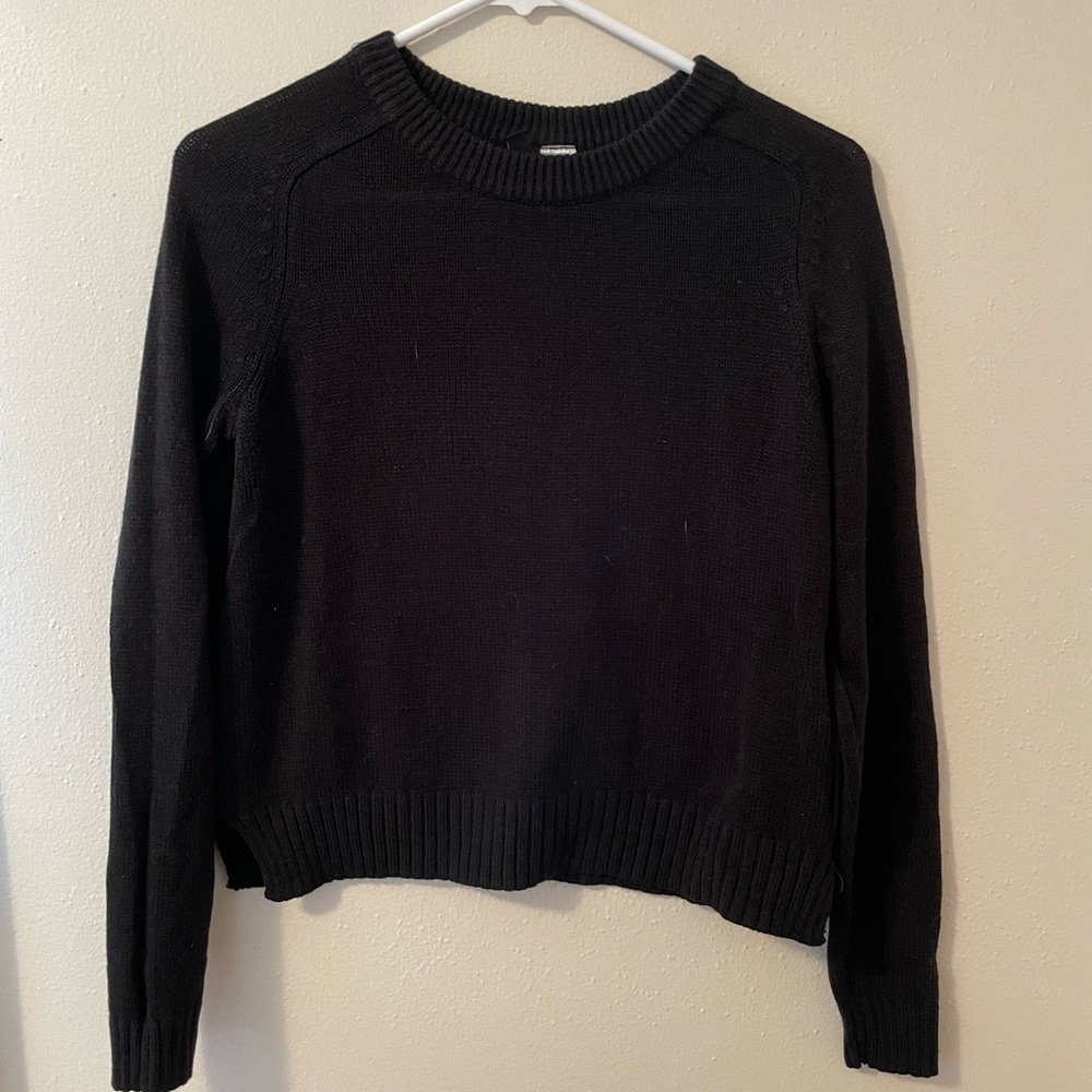 Divided black sweater